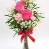 A beautiful array of Pink Roses, Carnations, and babys breath!