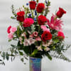 Featuring a sparkling vase that shines as bright as her, our Shimmering