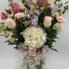 VASE ARRANGEMENT WITH SHADES OF PURPLES AND WHITE, ROSES, HYDRANGEA, WAX FLOWERS