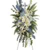 mixed bloe and white standing spray with crystal cross