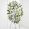 The Exquisite Tribute Standing Spray is an elegant display of sweet serenity.