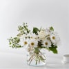 Let the breeze run through the white roses and eucalyptus for an