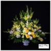 A sympathy basket arrangement yellow and white flowers; gladiolus, roses, stock, bells