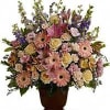A warm and peaceful bounty of pastel blossoms gently expresses love and