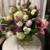 Stunning arrangement of Lilacs and complimenting flowers