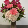 Frosted pink or lavender vase, with hydrangeas, alstromeria, gerbs, roses, touches of
