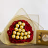 A dozen roses wrapped around a golden heart made of Ferrero chocolates