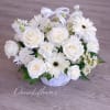 An all white flowers basket.

At Forage + Floral, every arrangement is one