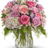 Pastel and pretty, hydrangea and roses, carnations and more. 