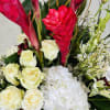 Experience a burst of vibrant colors with our exotic flower arrangement featuring
