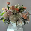 Arrangement of roses, hydrangea, tulips and ranunculus