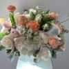 Arrangement of roses, hydrangea, tulips and ranunculus