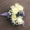 Spray Roses of your color choice with two ribbon accents of your