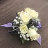 Spray Roses of your color choice with two ribbon accents of your
