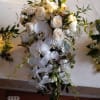Elegant &amp; classy white cascading bridal bouquet with white phalaenopsis and dendrobium