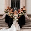 Elegant &amp; classy white cascading bridal bouquet with white phalaenopsis and dendrobium