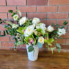Serene premium blooms in simplicity two main tones. White garden roses, green