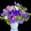 Shades of purple come together in this sweet garden arrangement.