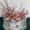 Baby Girl Arrangement beautifully arranged in a white vase. 
Each arrangement recreated