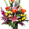 Breathtaking arrangement of roses, spray roses, stargazer lilies, hybrid delphinium, heather and