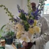 Beautiful white and blue hand tied bouquet for any occasion and graduation