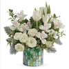 A peaceful bouquet of a white tulips, white  alstroemeria and white