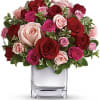 Sing her a love song - with flowers. This lush, loving arrangement