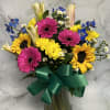 This arrangement includes a variety of colors and also everyone&#039;s favorite, SUNFLOWERS!