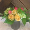 Our Seasonal bright arrangement is bright and fun. We hand select our