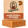 Boxed Dr. Squatch Wood Barrel Bourbon soap on a wooden block