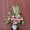 A large statement design, this traditional arrangement features bright stargazer lilies, pink