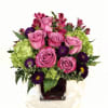 Pretty design including hydrangea, rose, mashumoto, astroemeria and accents in a glass