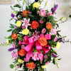 Colorful garden flowers in soothing shades to express your heartfelt sympathy.