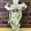 Beautiful resin cross that says &quot;May you find comfort in the arms