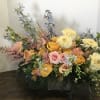 An amazing array of flowers such as larkspur, lisianthus, roses, astilbe, delphiniumspray