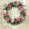 Commemorate a beautiful life with this lovely memorial wreath. Expertly designed with