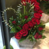 1 Dozen roses cleverly designed in the shape of a heart with