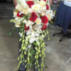 Cascade Bouquet with Roses, Orchids, Calla Lilies and Sotck.
