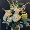 Enjoy this beautiful Sunnyside Specialty floral arrangement this holiday season.  Mixed