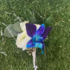 Boutonniere with Blue Orchid and others flowers.