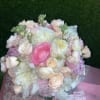 Round Tie Bride Bouquet with Peonies, Garden Roses, Ranunculus and Spray Roses.