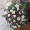 Beautiful white and burgundy/purple standing spray of white roses and carnations, burgundy