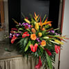Beautiful tropical flowers and foliage to honor a loved one&#039;s life. Tropical