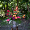 Deluxe image featured photo. Tropical tribute spray designed in an urn. This