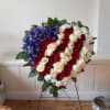 Beautiful bright blue red and white patriotic heart shaped standing spray