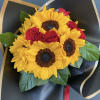 6 sunflowers and 6 red roses wrapped.  Glass vase not included