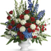 A dazzling display of patriotic red, white and blue flowers sends a