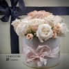 The perfect blush hatbox, filled with a variety of our prermium roses