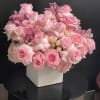 Roses, spray roses, orchids, hydrangeas in vase