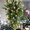 Simply beautiful Standing Spray Arrangement with soft, neutral colors.